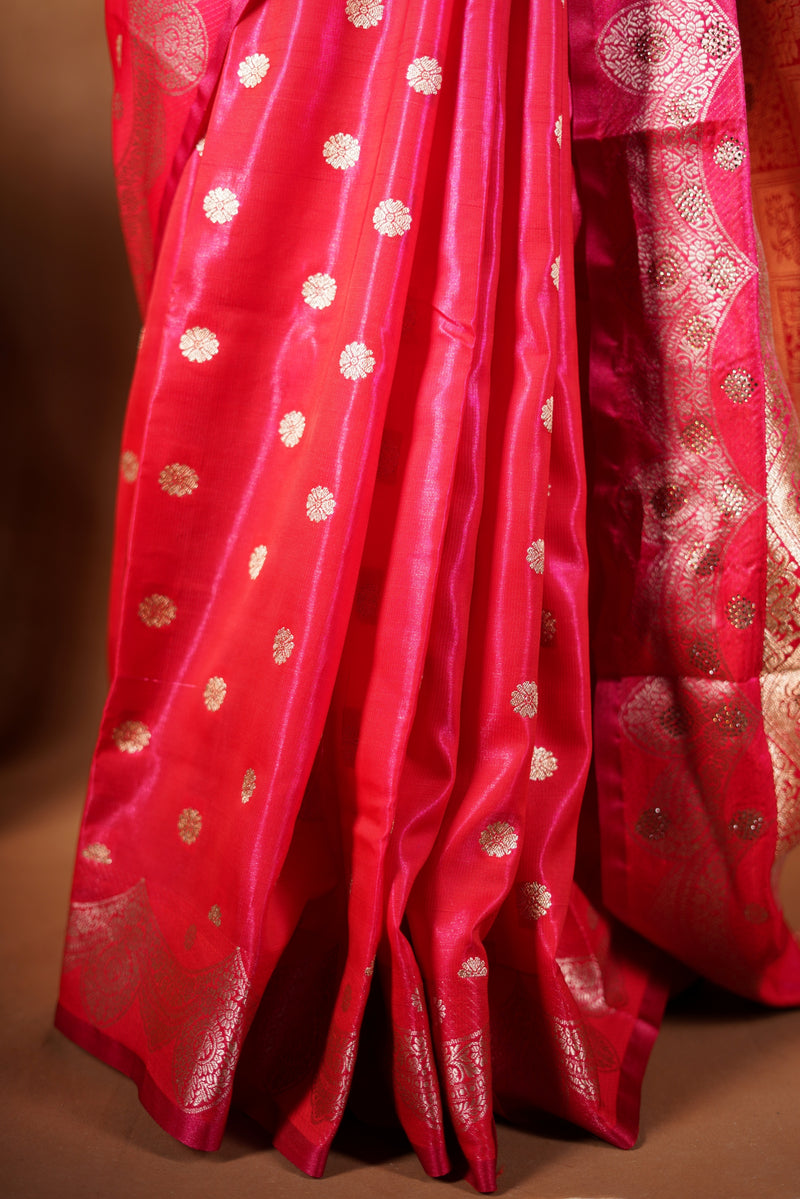 Red Banarasi Saree - A classic red Banarasi saree that showcases a rich and timeless colour appeal, with designer border that enhance the look and rich look pallu makes the saree rich paired with a matching blouse.