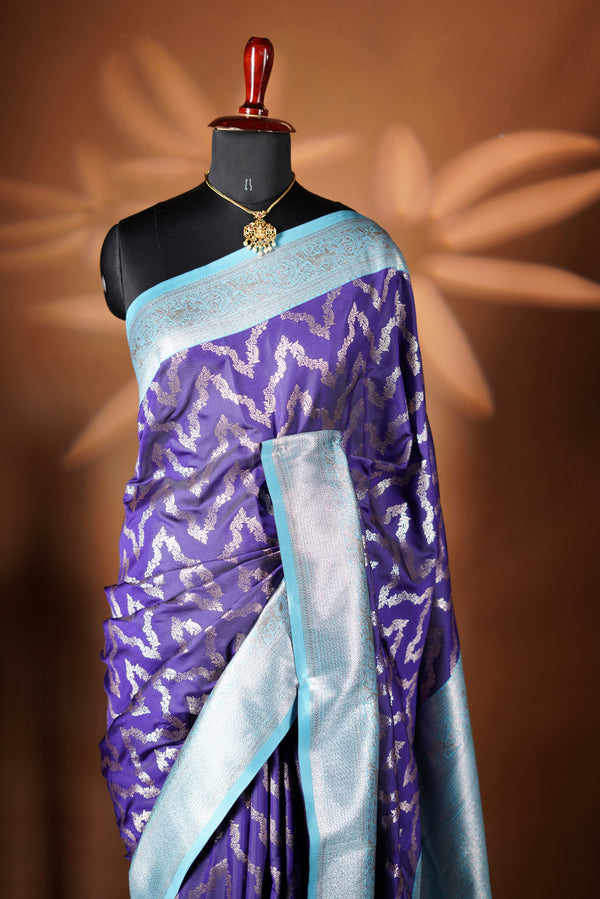 Royal Blue Banarasi Saree - A masterpiece of weaving, our Royal Blue Necklace Saree features a cascading silver-gold pattern that catches the light with every move with add on contrast blouse
