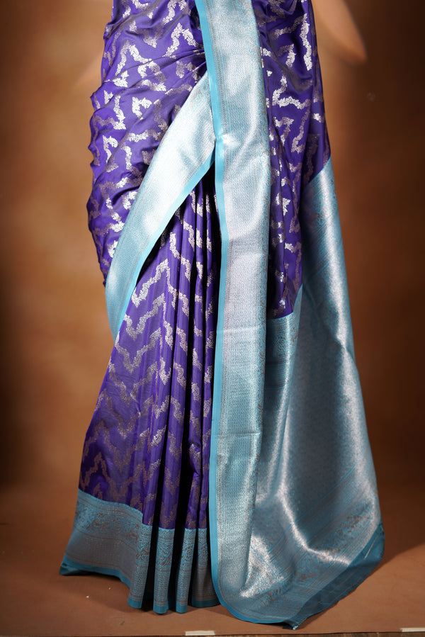 Royal Blue Banarasi Saree - A masterpiece of weaving, our Royal Blue Necklace Saree features a cascading silver-gold pattern that catches the light with every move with add on contrast blouse