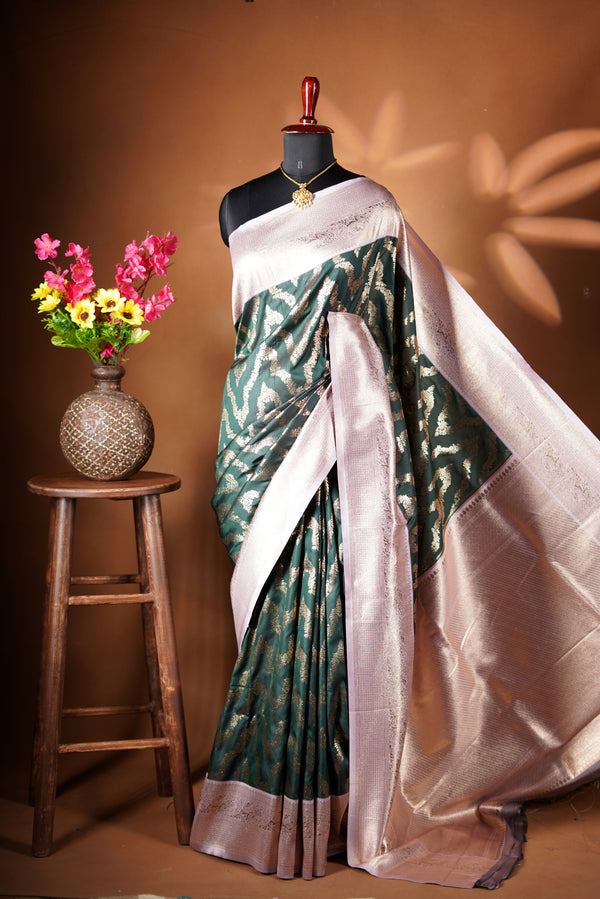 Bottle Green Necklace Saree - A masterpiece of weaving, Necklace Saree features a cascading silver-gold pattern that catches the light with every move with add on contrast blouse