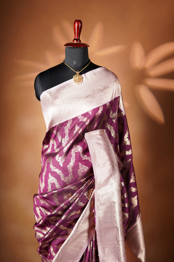 Deep Wine Bannarai Saree -  A masterpiece of weaving, Necklace Saree features a cascading silver-gold pattern that catches the light with every move with add on contrast blouse