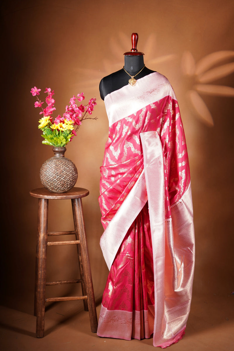 Rani Pink Banarasi Saree - A masterpiece of weaving, Necklace Saree features a cascading silver-gold pattern that catches the light with every move with add on contrast blouse