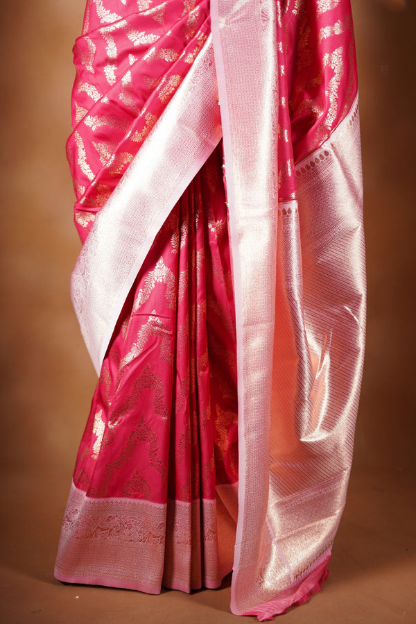 Rani Pink Banarasi Saree - A masterpiece of weaving, Necklace Saree features a cascading silver-gold pattern that catches the light with every move with add on contrast blouse