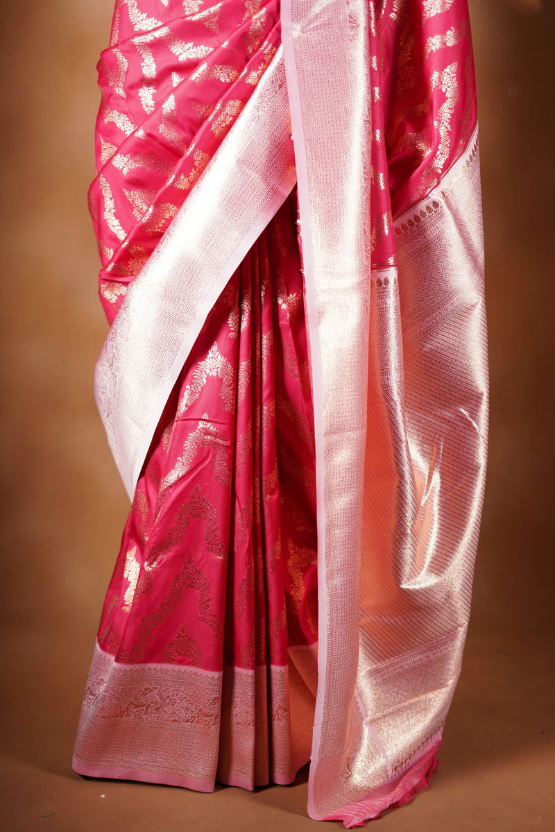 Rani Pink Banarasi Saree - A masterpiece of weaving, Necklace Saree features a cascading silver-gold pattern that catches the light with every move with add on contrast blouse