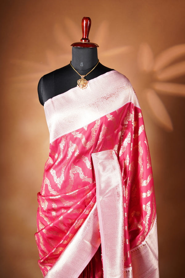 Rani Pink Banarasi Saree - A masterpiece of weaving, Necklace Saree features a cascading silver-gold pattern that catches the light with every move with add on contrast blouse