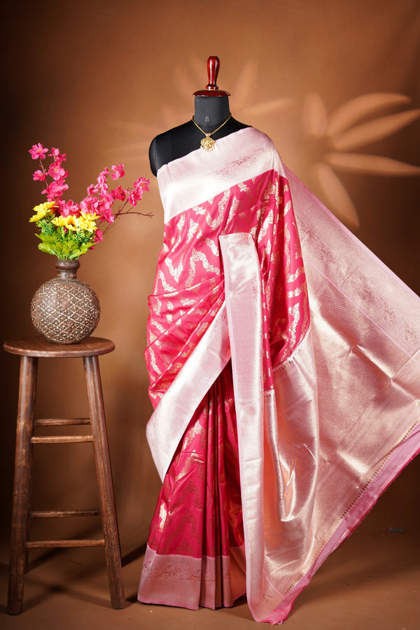 Rani Pink Banarasi Saree - A masterpiece of weaving, Necklace Saree features a cascading silver-gold pattern that catches the light with every move with add on contrast blouse