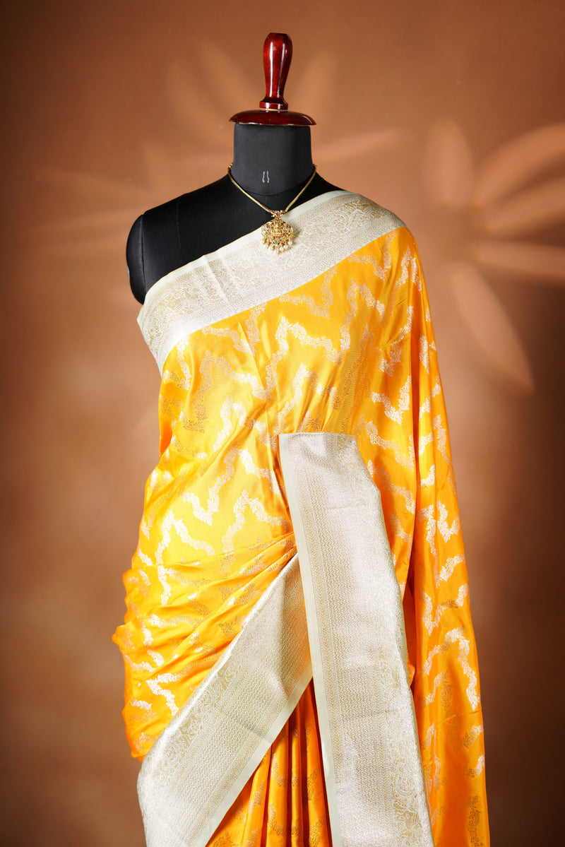 Bright Yellow Banarasi Saree - A masterpiece of weaving, Necklace Saree features a cascading silver-gold pattern that catches the light with every move with add on contrast blouse