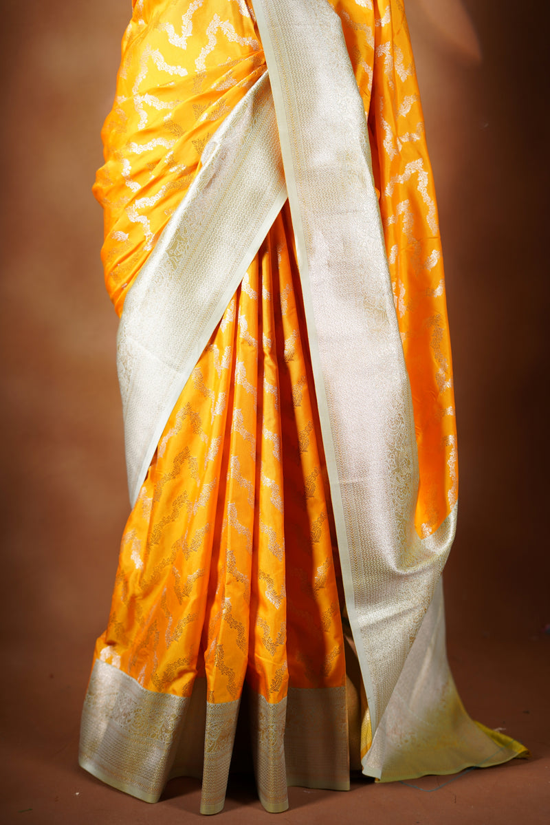 Bright Yellow Banarasi Saree - A masterpiece of weaving, Necklace Saree features a cascading silver-gold pattern that catches the light with every move with add on contrast blouse