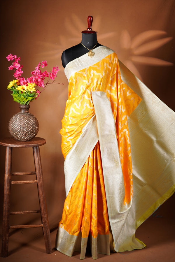 Bright Yellow Banarasi Saree - A masterpiece of weaving, Necklace Saree features a cascading silver-gold pattern that catches the light with every move with add on contrast blouse
