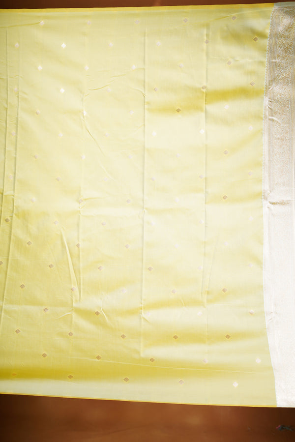 Bright Yellow Banarasi Saree - A masterpiece of weaving, Necklace Saree features a cascading silver-gold pattern that catches the light with every move with add on contrast blouse