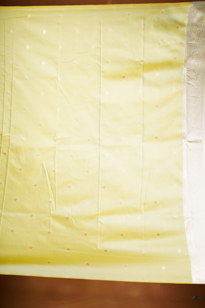 Bright Yellow Banarasi Saree - A masterpiece of weaving, Necklace Saree features a cascading silver-gold pattern that catches the light with every move with add on contrast blouse