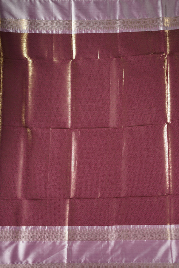 Kancheepuram Silk Saree - Maroon bodice with golden lurex line through the saree designed with rich border pattern work with zari buttas add on matching silk blouse piece.