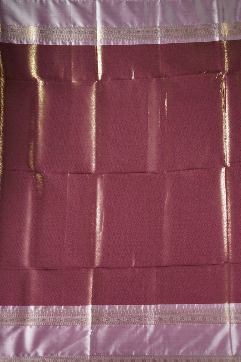 Kancheepuram Silk Saree - Maroon bodice with golden lurex line through the saree designed with rich border pattern work with zari buttas add on matching silk blouse piece.
