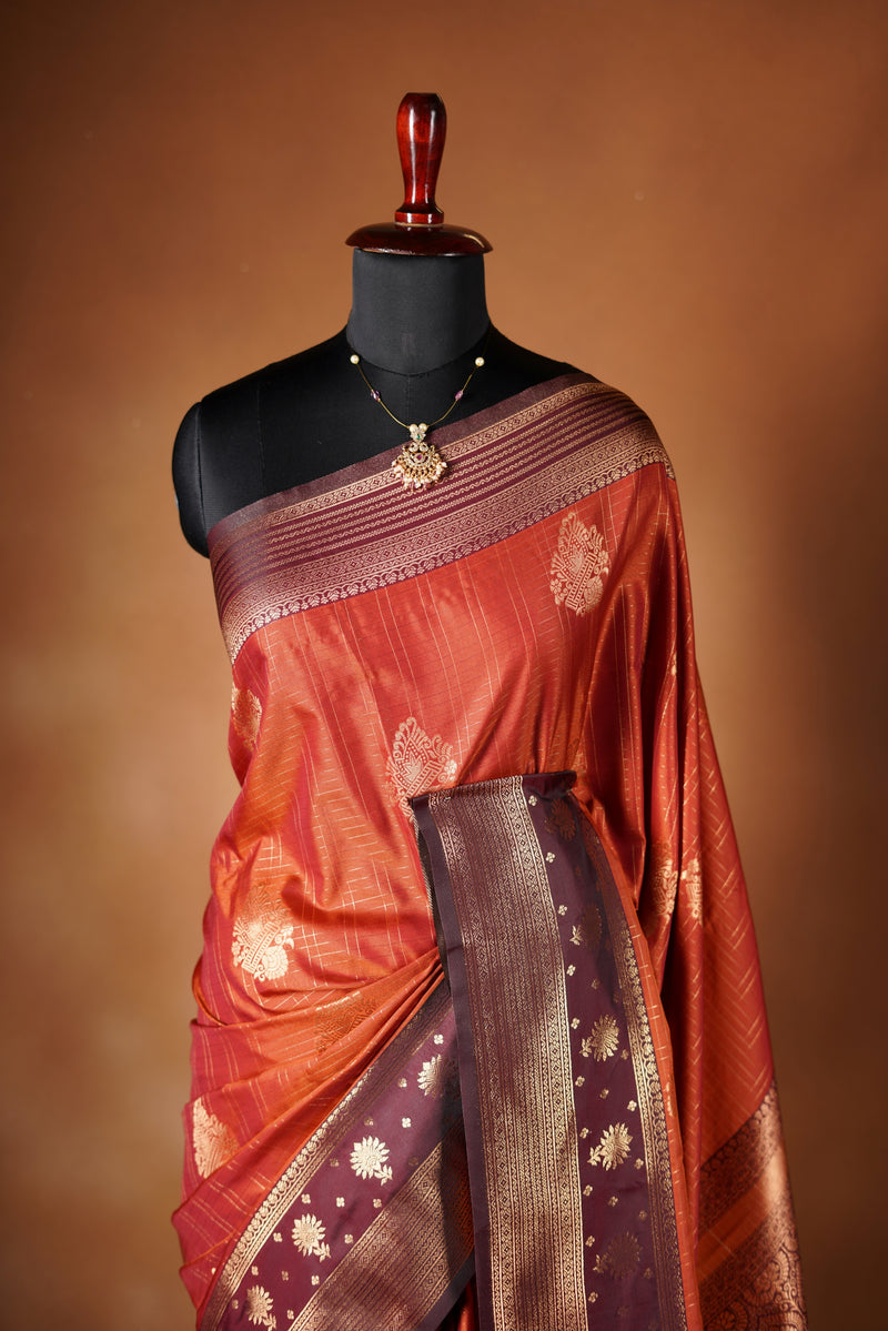 Kancheepuram Silk Saree - Rust orange with maroon border silk saree designed with rich border pattern work with zari buttas add on matching silk blouse piece.