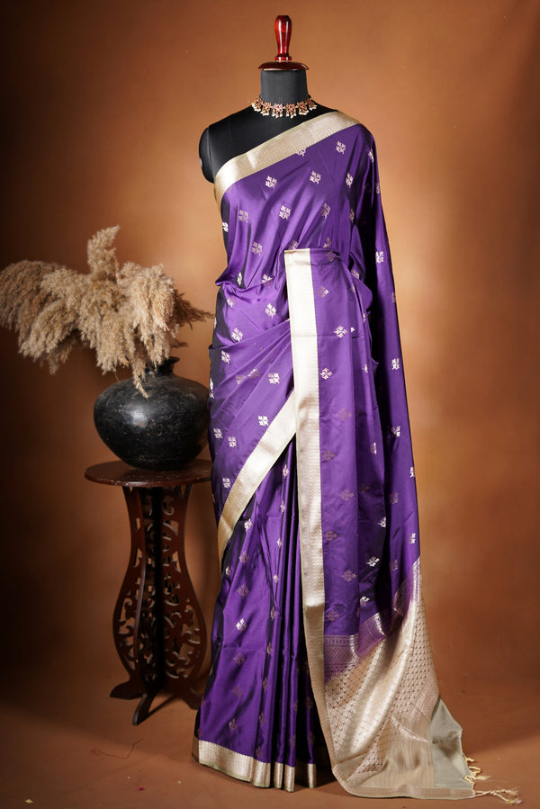 Soft Silk Saree - Royal purple soft silk saree densely woven zari pattern in a Champagne gold time finished with delicate hand - tied tassels for a added to touch of elegance and paired with blouse