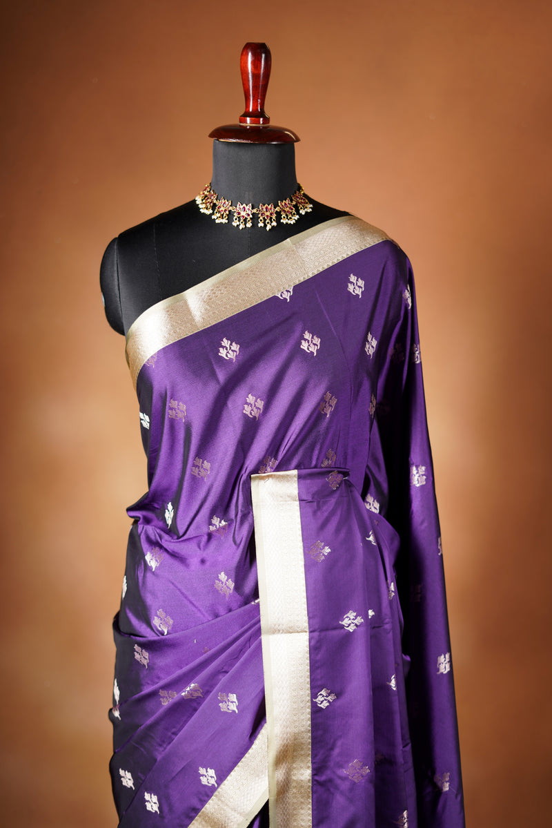 Soft Silk Saree - Royal purple soft silk saree densely woven zari pattern in a Champagne gold time finished with delicate hand - tied tassels for a added to touch of elegance and paired with blouse