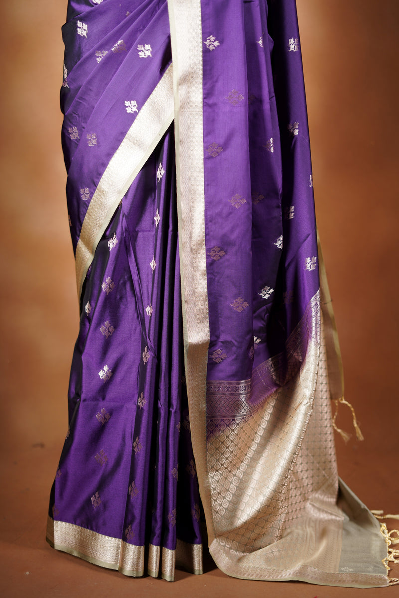 Soft Silk Saree - Royal purple soft silk saree densely woven zari pattern in a Champagne gold time finished with delicate hand - tied tassels for a added to touch of elegance and paired with blouse