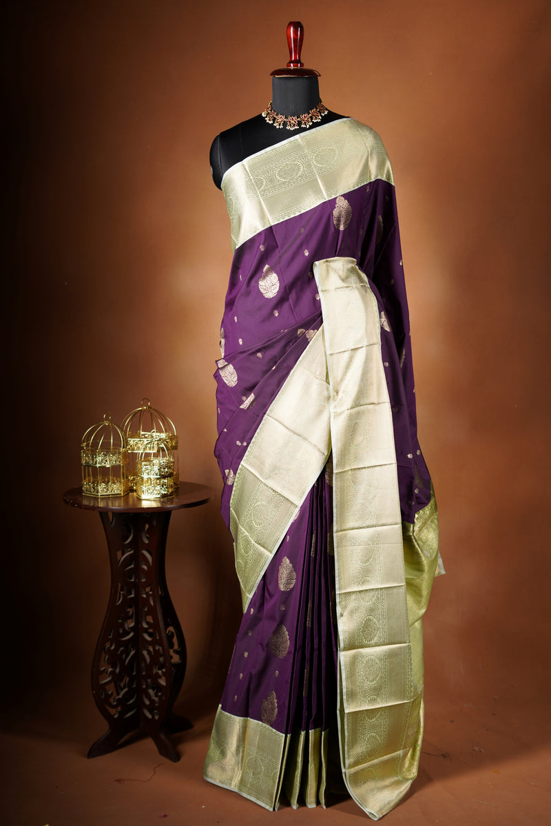 Semi Silk Saree - featuring ornate circular and floral patterns that signify its suitability for grand occasions with heavy pallu work and attached contrast blouse