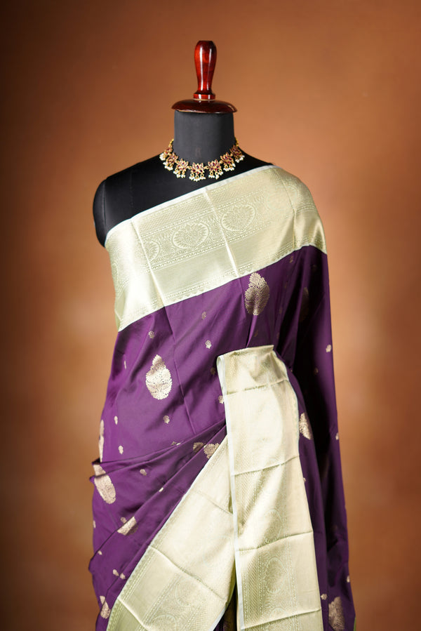 Semi Silk Saree - featuring ornate circular and floral patterns that signify its suitability for grand occasions with heavy pallu work and attached contrast blouse