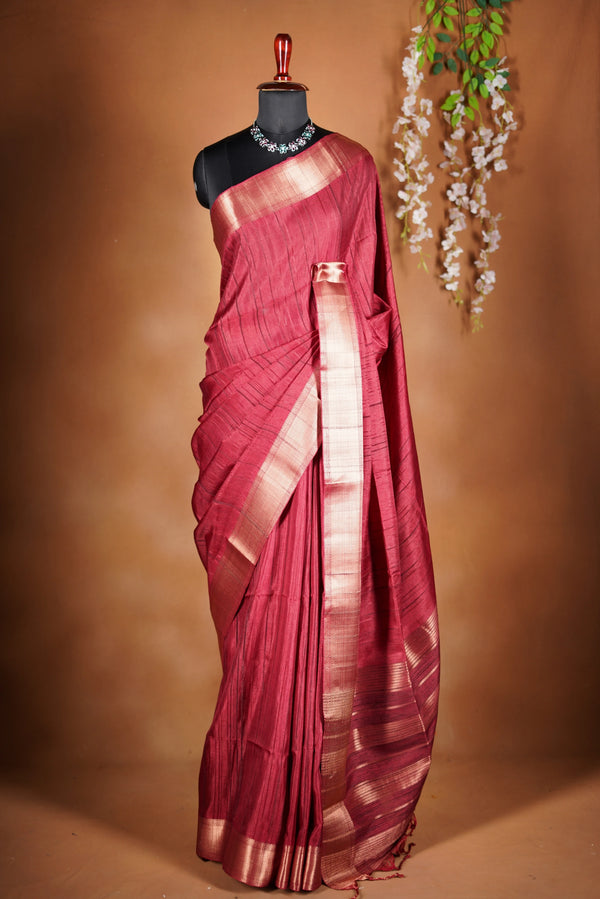 Crimson red Semi Tussar Saree - The rich hue is elevated with a smooth texture and a shimmering zari border and attached blouse that enhances its festive appeal