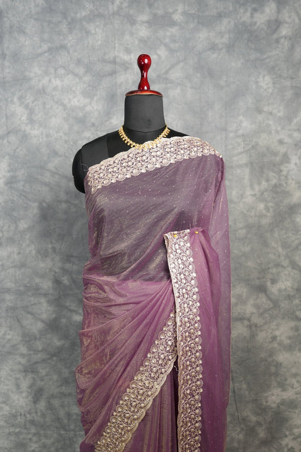 Dusty Mauve Purple Party Wear Saree with Elegant Embroidered Border, Soft Shimmer Finish & Graceful Flow Perfect for Wedding, Reception, Festive Celebration & Traditional Occasion Styling for Women