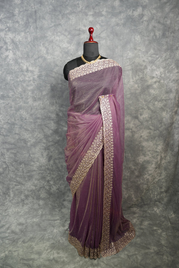 Dusty Mauve Purple Party Wear Saree with Elegant Embroidered Border, Soft Shimmer Finish & Graceful Flow Perfect for Wedding, Reception, Festive Celebration & Traditional Occasion Styling for Women
