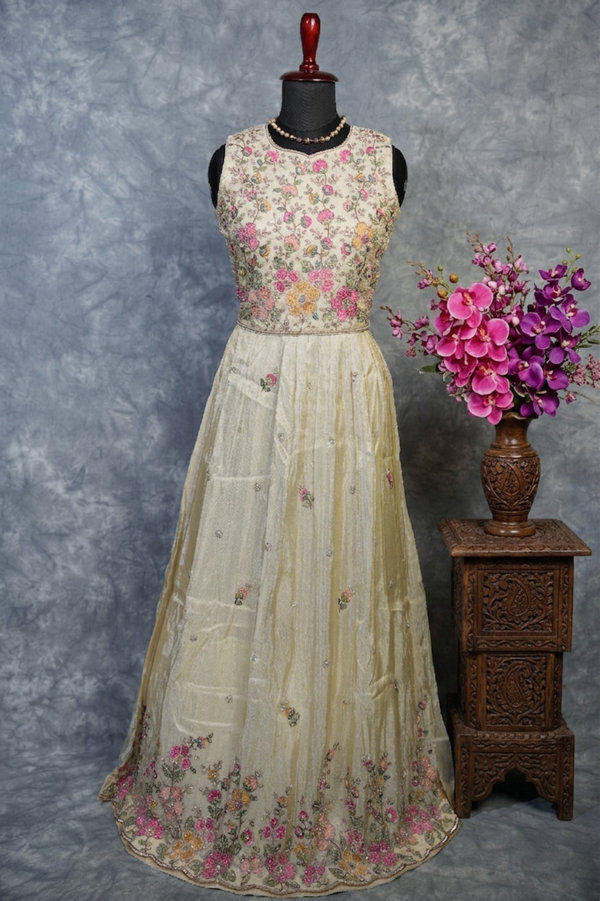 Ivory Blossom Silk Anarkali Set – A graceful ivory silk Anarkali set featuring a soft, elegant tone with delicate detailing that enhances its charm, offering a rich, flowing silhouette perfect for festive occasions and refined traditional wear.