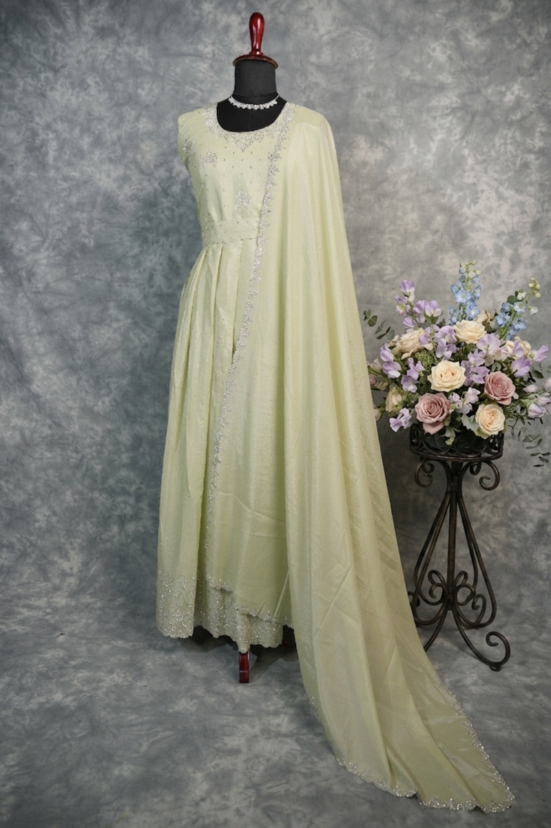 Mint Cream Stone Chudi Maxi Set – A graceful blend of mint and cream tones, beautifully highlighted with delicate stone detailing. Designed for a refined and elegant look, this maxi set offers a flattering silhouette with a touch of subtle sparkle.