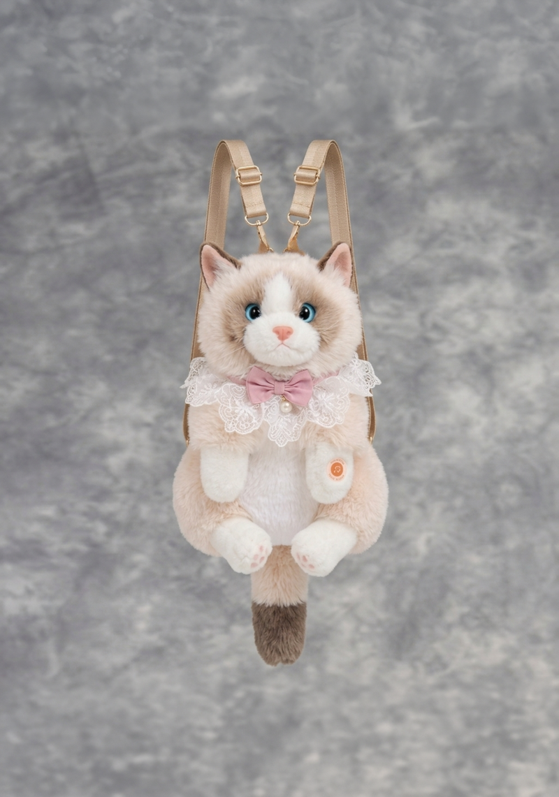 Plush cat-shaped backpack with a bow tie on a gray background