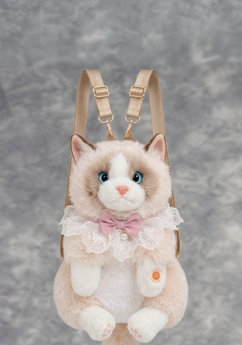 Plush cat-shaped backpack with a bow tie on a gray background