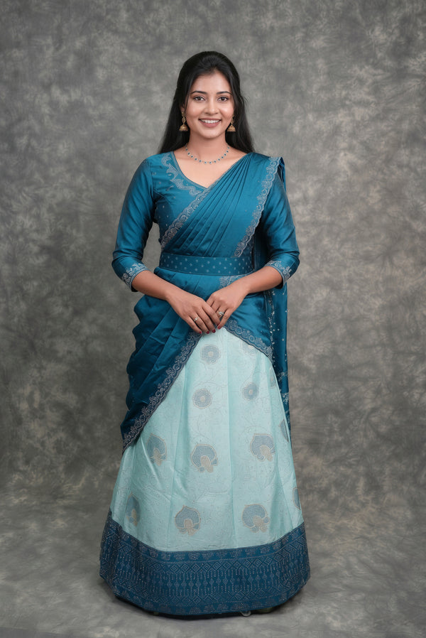 Peacock Blue with Aqua Blue Lehenga A beautiful blend of rich peacock blue and soft aqua blue shades with elegant detailing, crafted for a graceful festive and wedding look