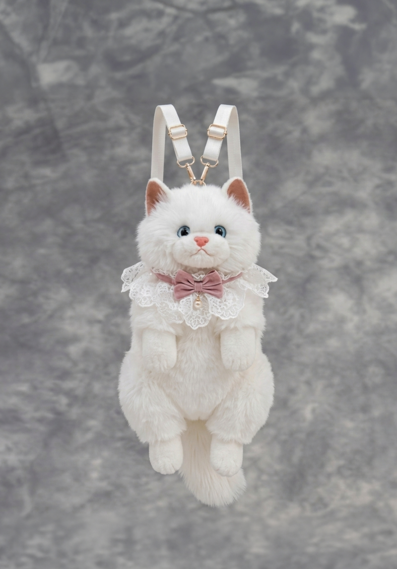 White fluffy cat-shaped backpack with a pink bow on a gray background